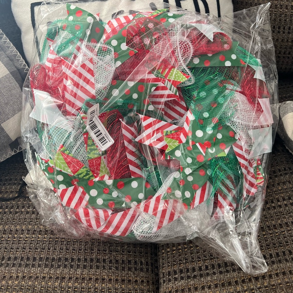 Christmas wreath never used it, pulled out of package just to take a picture